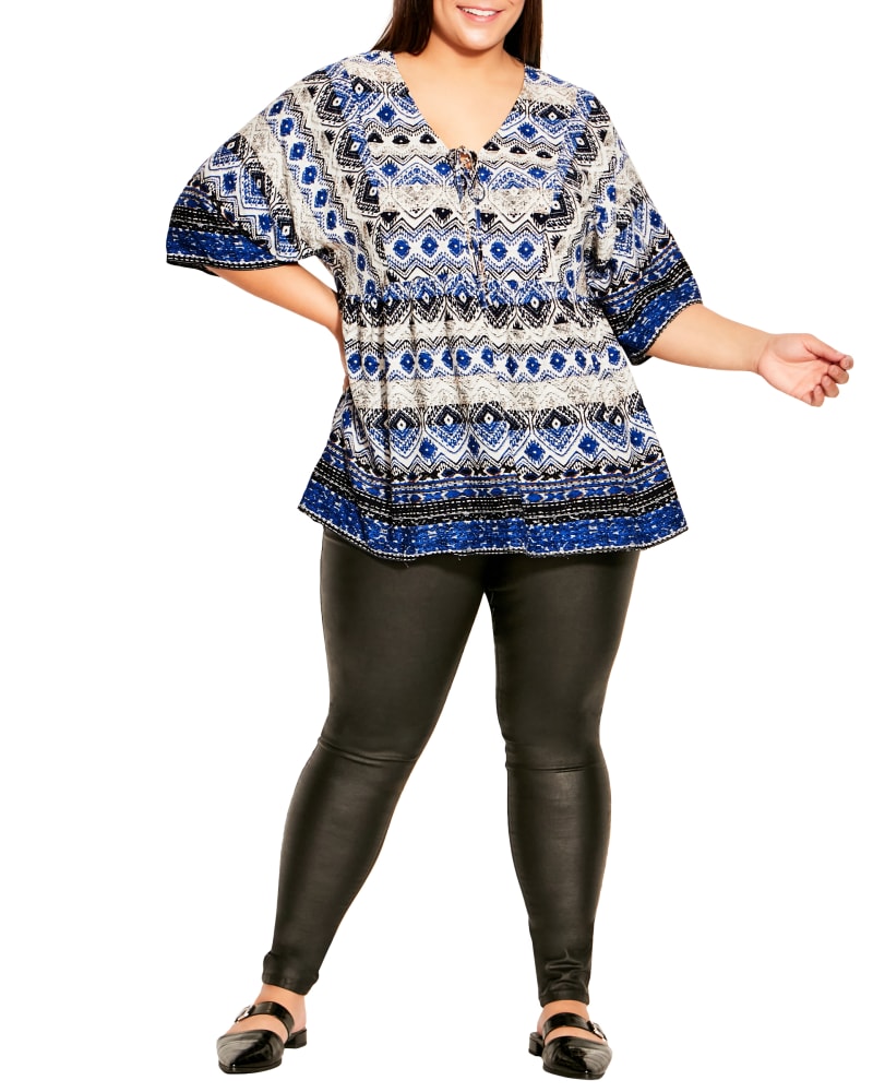 Plus size model wearing Maeve Lace-Up Boho Top by Avenue | Dia&Co | dia_product_style_image_id:191299